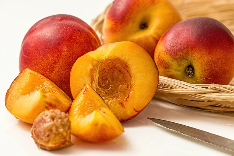 A slice of peach pie (one-eighth of a 9-inch pie) contains approximately 320–400 calories. Peaches themselves are nutritious, providing vitamins A and C, potassium, dietary fiber, and antioxidants including beta-carotene and lutein.