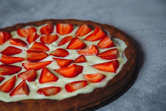 The most popular version features a pre-baked crust filled with fresh whole or halved strawberries coated in a glossy glaze. 